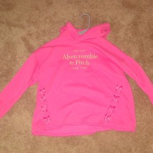 A pink Abercrombie kids top with a hood